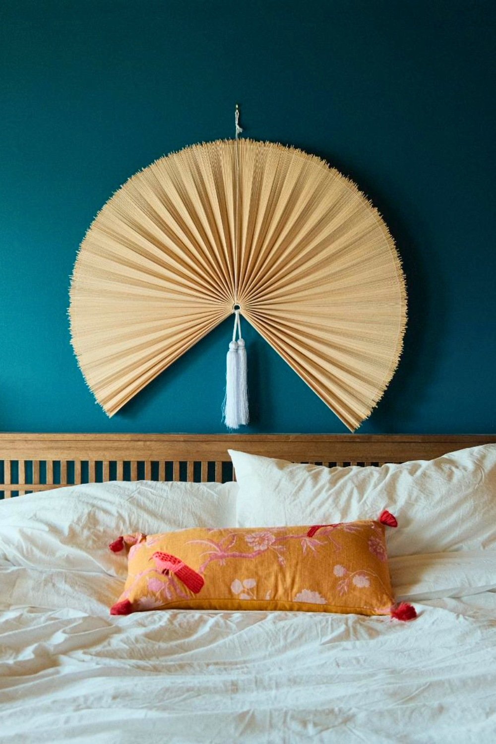 Silken Peacock Paint Color With Rattan Fan Wall Decor
